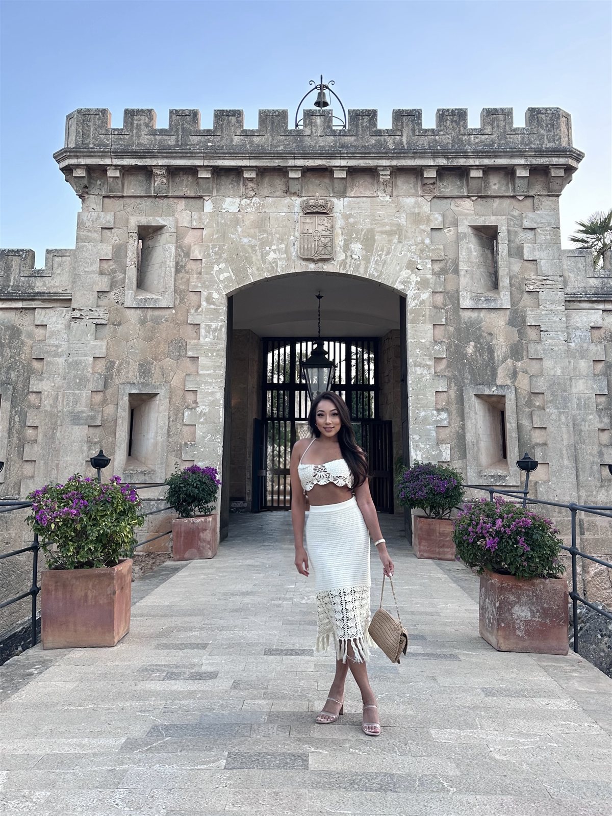 Liza at the gates of a historic Mallorcan fortress